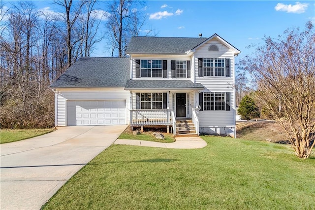 front of property featuring a porch, a garage, and a front lawn