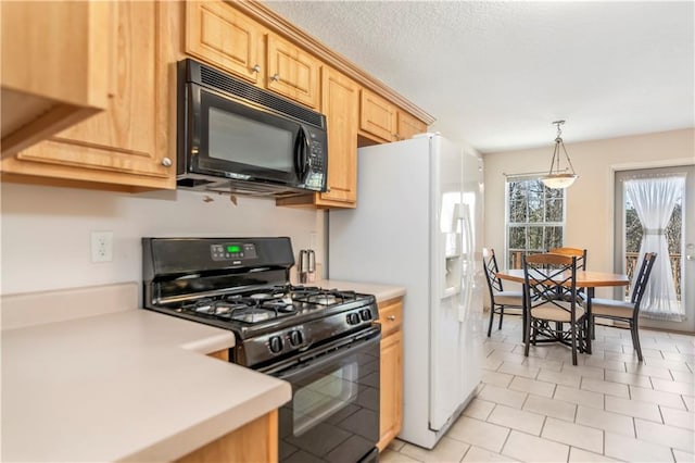 kitchen with black appliances, pendant lighting, light tile patterned floors, and light brown cabinets