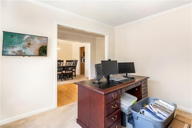 office area featuring light colored carpet and crown molding