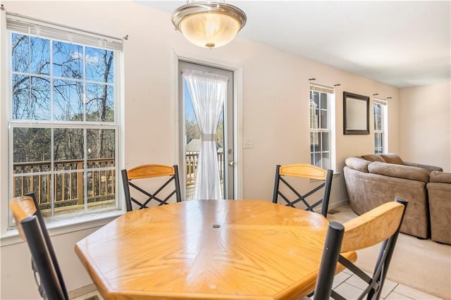 dining space featuring a healthy amount of sunlight