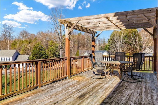 wooden terrace with a pergola