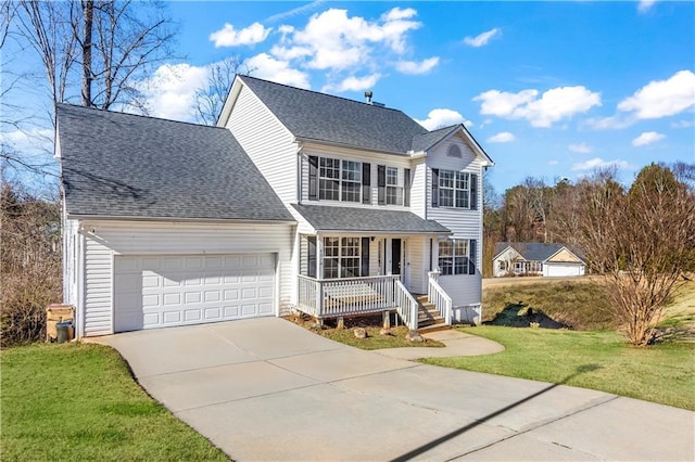 view of front property featuring covered porch, a garage, and a front lawn