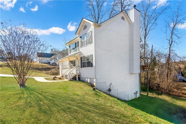 view of property exterior featuring a yard