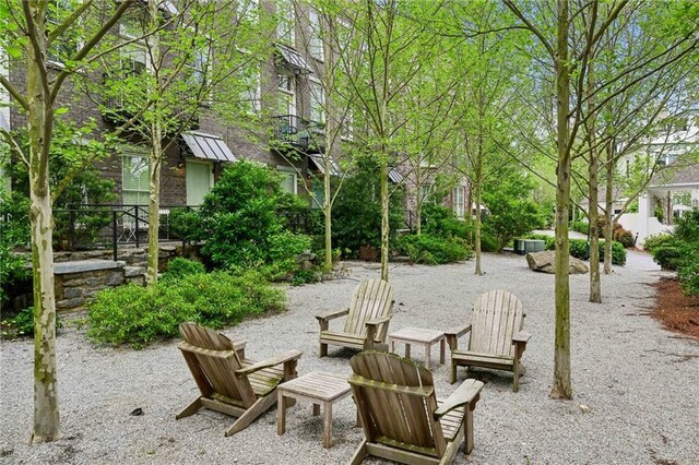 exterior space featuring a fire pit and a patio area