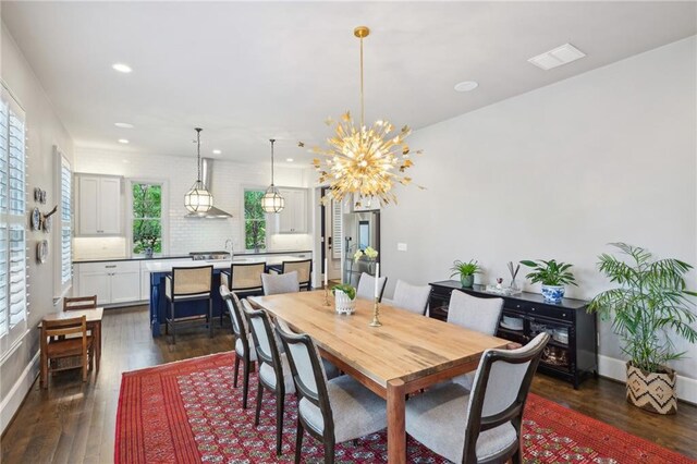 dining room with dark wood-style flooring, recessed lighting, and visible vents