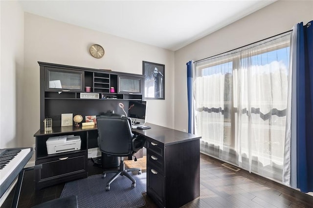 home office featuring dark hardwood / wood-style floors