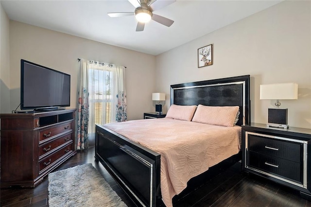 bedroom with dark hardwood / wood-style floors and ceiling fan