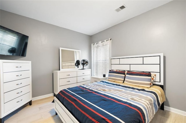 bedroom featuring light wood-type flooring