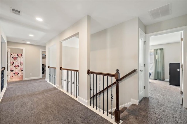 corridor with carpet floors