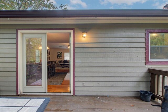 doorway to property with a wooden deck