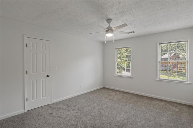 4220 Singing Post Ln NE, Roswell, GA 30075 - carpeted spare room with a ceiling fan, baseboards, and a textured ceiling