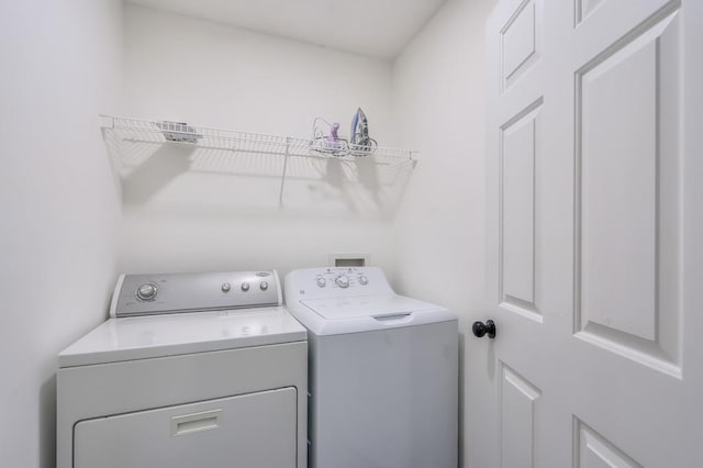 laundry area with laundry area and washing machine and dryer