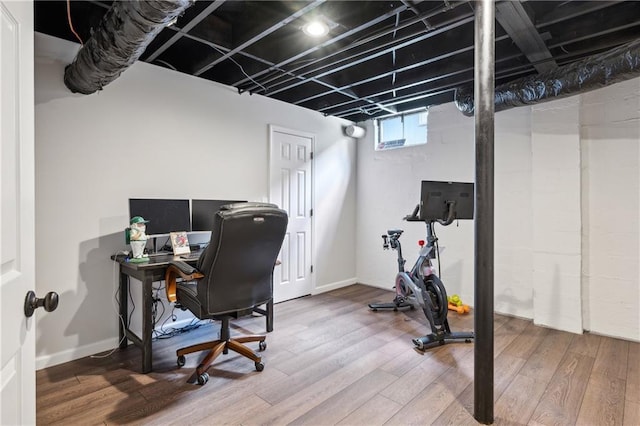 office space with wood finished floors