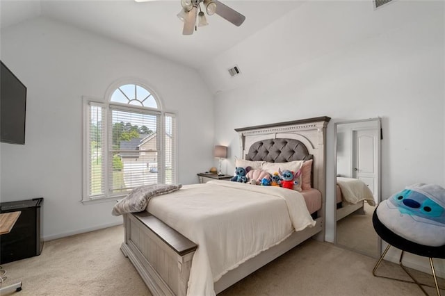 bedroom featuring light carpet, multiple windows, high vaulted ceiling, a ceiling fan, and baseboards