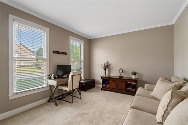office area with ornamental molding, baseboards, and light colored carpet