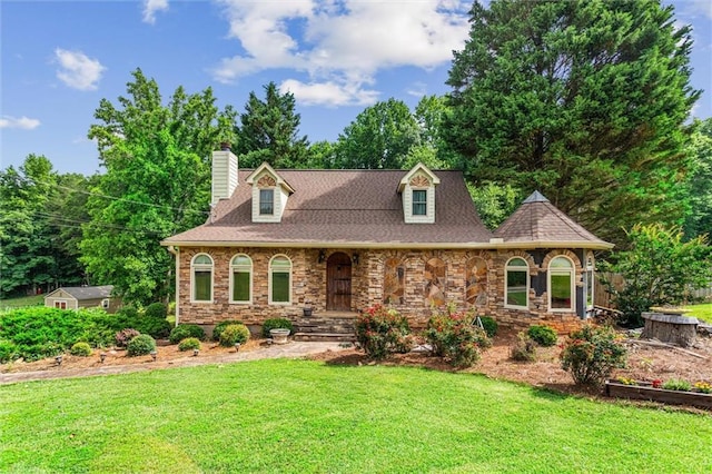 150 Wilbanks St, Buford, GA 30518 - view of front facade with a front lawn, stone siding, and a chimney