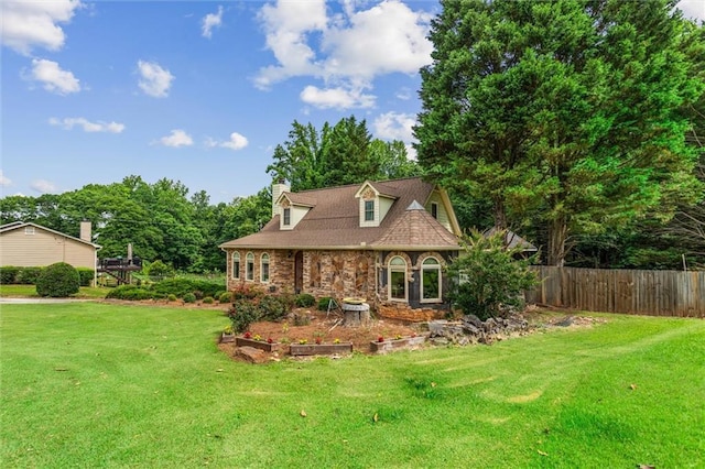 150 Wilbanks St, Buford, GA 30518 - new england style home featuring stone siding and a chimney