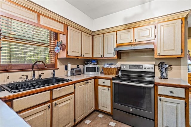 150 Wilbanks St, Buford, GA 30518 - kitchen featuring stainless steel appliances, a sink, under cabinet range hood, and light countertops