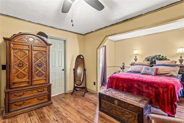 150 Wilbanks St, Buford, GA 30518 - bedroom with wood finished floors, a ceiling fan, and baseboards