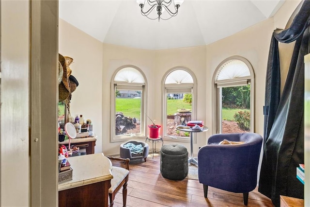 150 Wilbanks St, Buford, GA 30518 - sitting room featuring lofted ceiling, hardwood / wood-style floors, and a chandelier