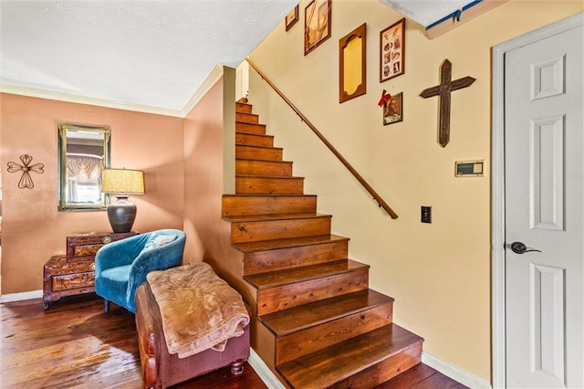 150 Wilbanks St, Buford, GA 30518 - stairs featuring hardwood / wood-style flooring, baseboards, and crown molding