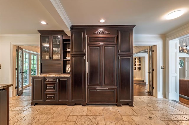 bar featuring stone tile flooring, recessed lighting, baseboards, and crown molding