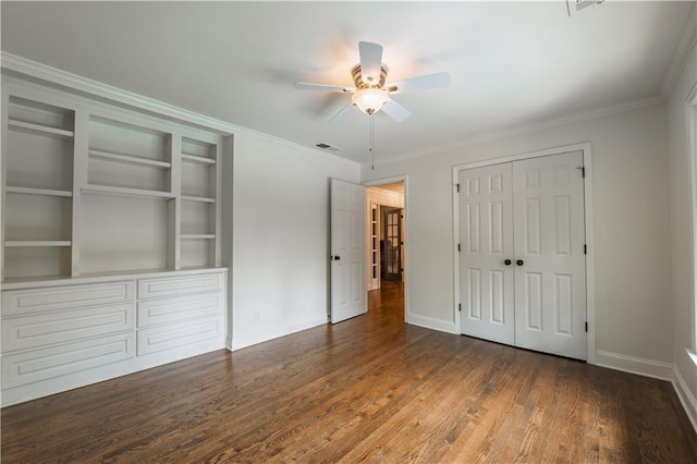 unfurnished bedroom with a ceiling fan, a closet, baseboards, ornamental molding, and wood finished floors