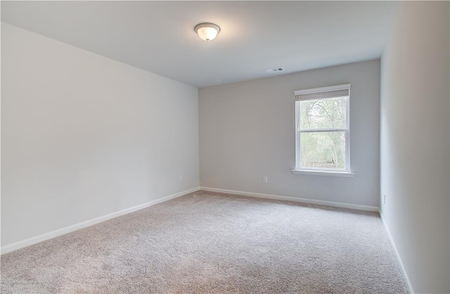 view of carpeted spare room