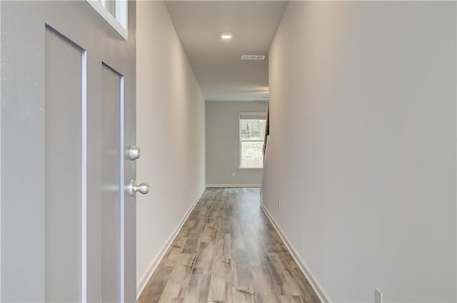 corridor featuring light wood-type flooring