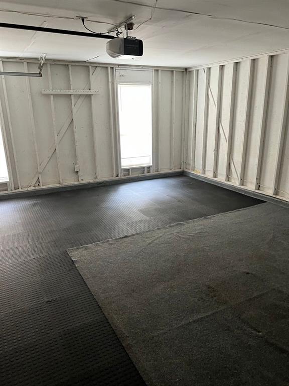 432 Manor Estates Dr, Stockbridge, GA 30281 - garage with a garage door opener