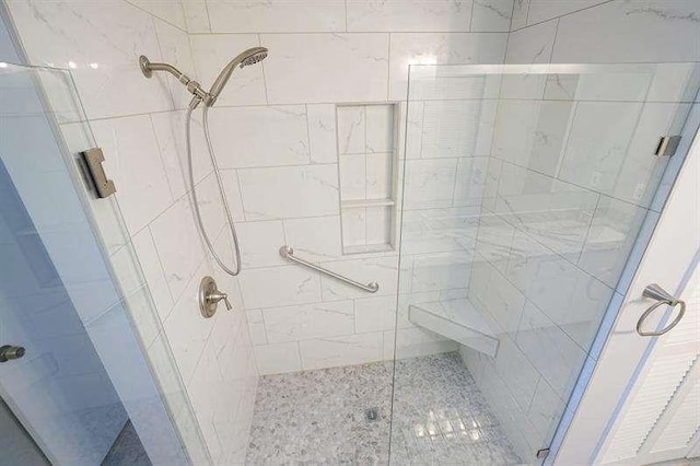 full bathroom with a stall shower