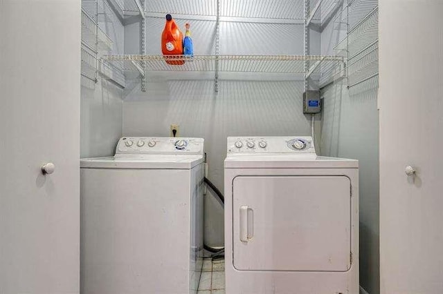 laundry area featuring laundry area and washer and dryer