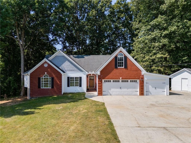 view of front of house with a garage, a front yard, brick siding, and driveway