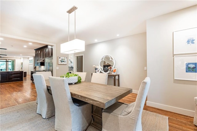 dining room featuring light wood-type flooring