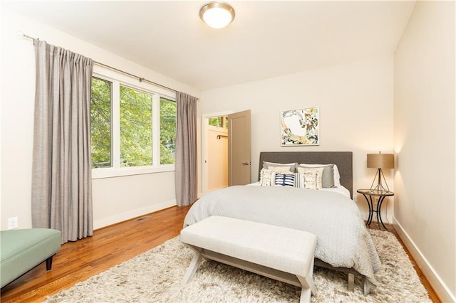 bedroom featuring hardwood / wood-style floors