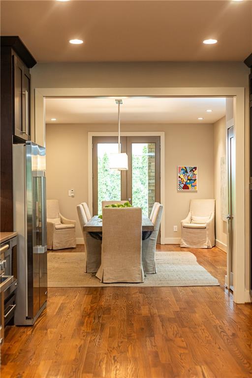 dining area featuring wood-type flooring