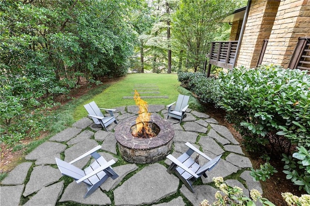 view of patio featuring an outdoor fire pit