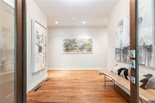 sitting room with light wood-type flooring