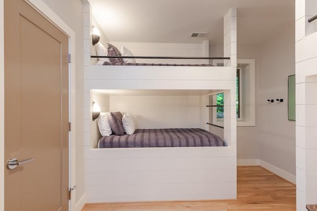 bedroom featuring light wood-type flooring