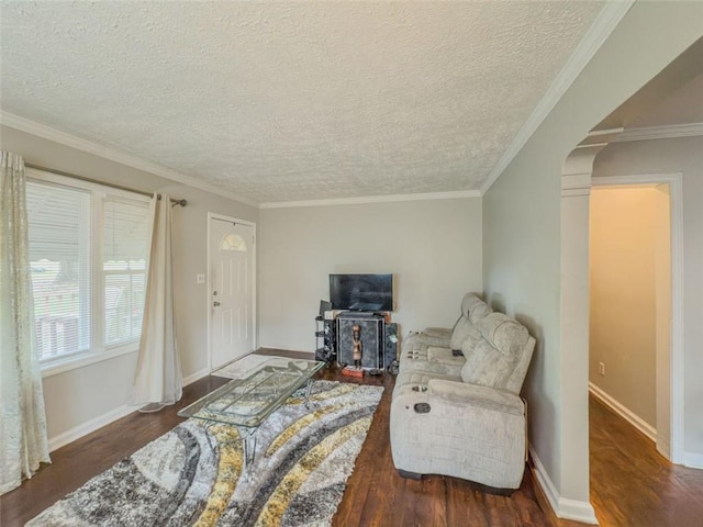 646 Quillian Ave, Decatur, GA 30032 - living room with arched walkways, a textured ceiling, and wood finished floors