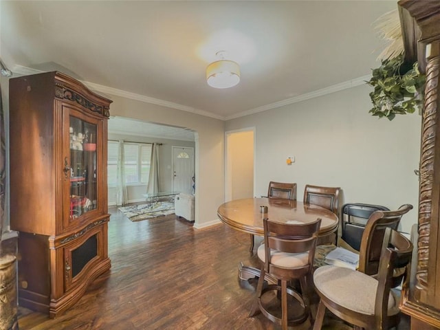 646 Quillian Ave, Decatur, GA 30032 - dining space with crown molding, baseboards, and wood finished floors