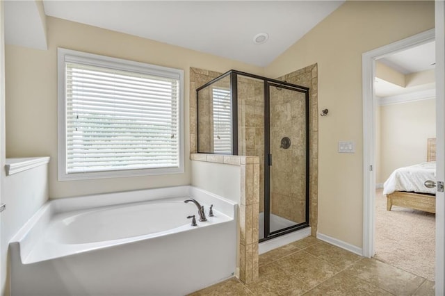 11686 Davenport Ln, Alpharetta, GA 30005 - ensuite bathroom featuring a bath, a stall shower, and plenty of natural light