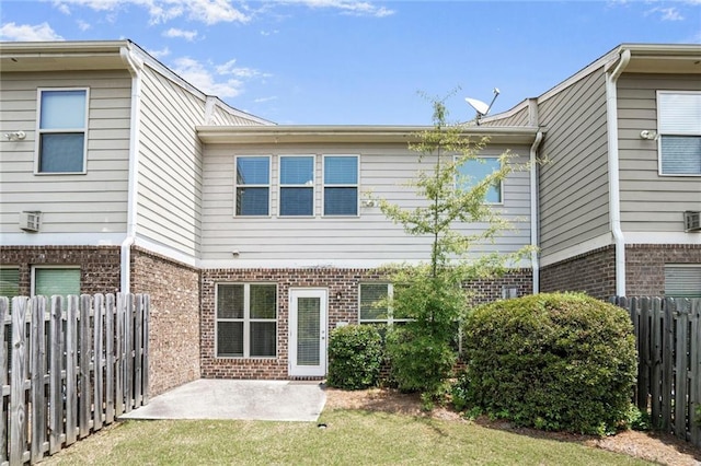 11686 Davenport Ln, Alpharetta, GA 30005 - rear view of property with brick siding and a patio area