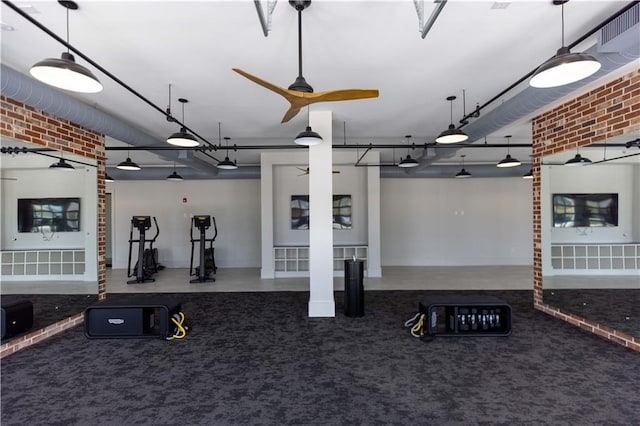 5440 Howington Ct Unit 190, Buford, GA 30518 - exercise room featuring brick wall, a ceiling fan, and carpet