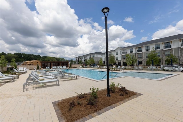 5440 Howington Ct Unit 190, Buford, GA 30518 - community pool featuring a patio area
