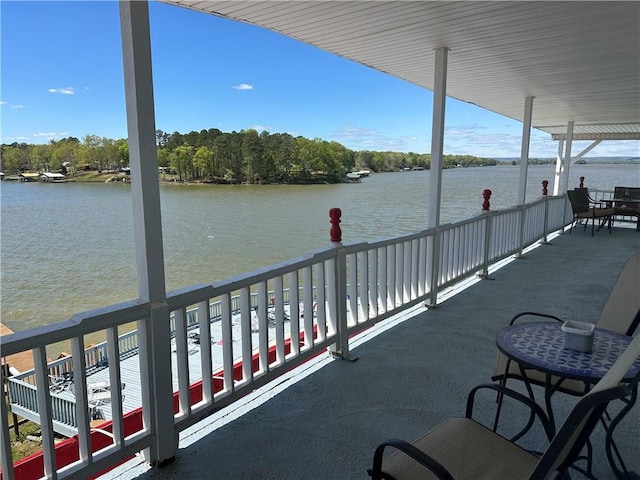 balcony featuring a water view