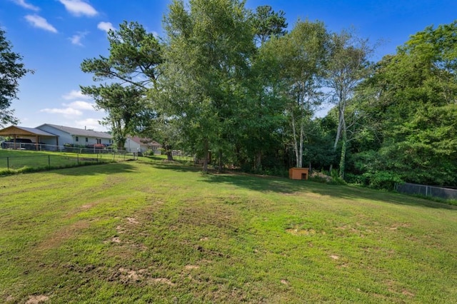 view of yard with fence