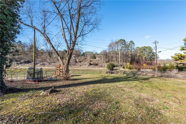 view of yard featuring a trampoline