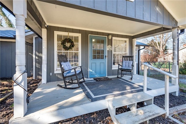 doorway to property with a porch