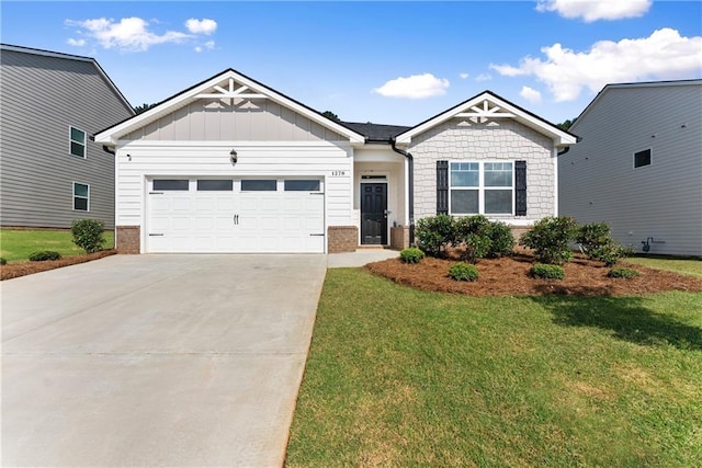 1278 Daurian Dr, Statham, GA 30666 - craftsman inspired home with brick siding, a front lawn, concrete driveway, and an attached garage